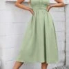 New Casual Slight Stretch Solid Color Neck Strap Midi Dress Wholesale Midi Dresses